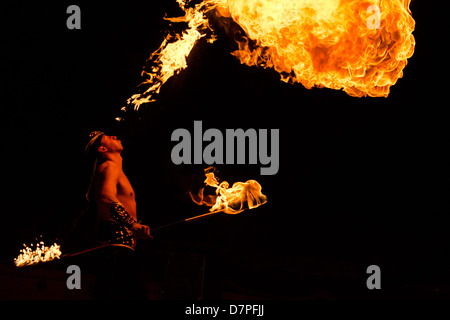 a man breathing fire from his mouth Stock Photo