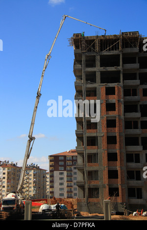 construction of building with cement mixture machine Stock Photo