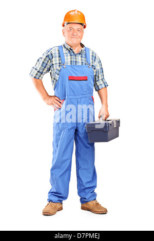 Full length portrait of a confident manual worker holding a toolbox isolated on white background Stock Photo
