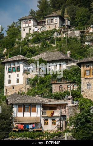 Traditional, ottoman period, stone roofed, houses in the old town of Gjirokastra in southern Albania. Stock Photo