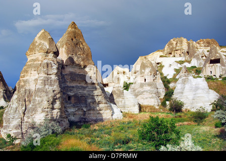 Cappadocia landscape with vulcanic rocks and houses carved in this rock. (Goreme village) Stock Photo