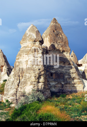 Cappadocia landscape with vulcanic rocks and houses carved in this rock. (Goreme village) Stock Photo