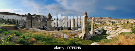 Cappadocia landscape with vulcanic rocks and houses carved in this rock. (Goreme village). Love Valley. Anatolia, Turkey. Stock Photo