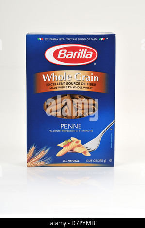 Unopened box of Barilla whole grain penne pasta on white background, cutout. USA Stock Photo