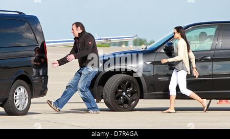 Cochstedt, Germany, 12 May 2013.  US actor Matt Damon's wife Luciana Barroso arrives at the airport of Cochstedt, Germany, 12 May 2013. Barroso accompanies Damon who is in Germany to participate in George Clooney's new film 'The Monuments Men'. Photo: Matthias Bein /DPA/Alamy Live News Stock Photo