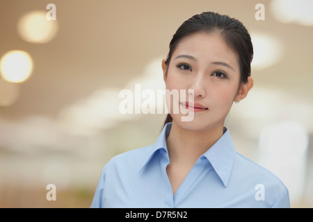 Portrait of young smiling businesswoman, Beijing Stock Photo