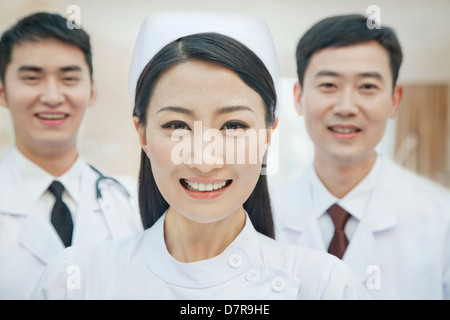 Portrait of Healthcare workers in China, Two Doctors and Nurse Stock Photo