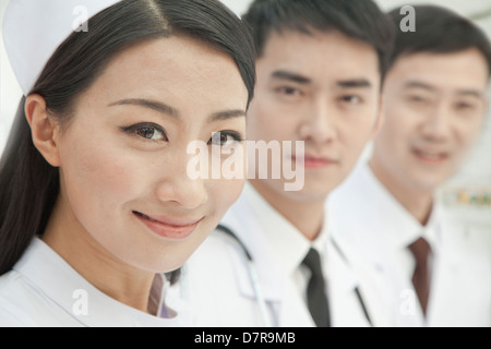 Healthcare workers standing in a row, China, Close-up Stock Photo