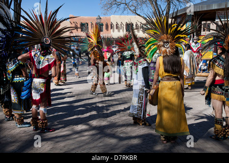 A dance performance by the Danza Azteca de Anahuac on the Dia de Cuautemoc on the Plaza in Taos, New Mexico. Stock Photo