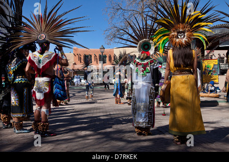 A dance performance by the Danza Azteca de Anahuac on the Dia de Cuautemoc on the Plaza in Taos, New Mexico. Stock Photo