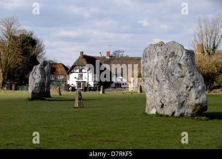 Red Lion pub amongst Standing stones at Avebury Stone Circle, Avebury, Wiltshire, UK Stock Photo