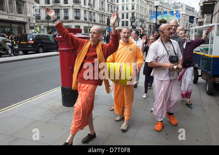 Followers of Hare Krishna promoting their faith in London, UK. Stock Photo