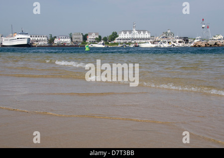 Rhode Island, Block Island. Beach view of New Shoreham and the historic waterfront National Hotel in the distance. Stock Photo