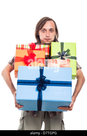 Man carrying many gift boxes, isolated on white background Stock Photo