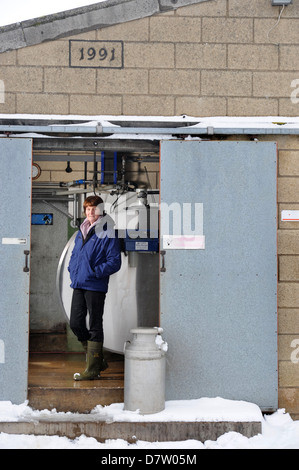 Dairy Farmer Liz Best from Poole Farm Leighterton near Tetbury, Gloucestershire who has had to discard milk when the tanker has Stock Photo