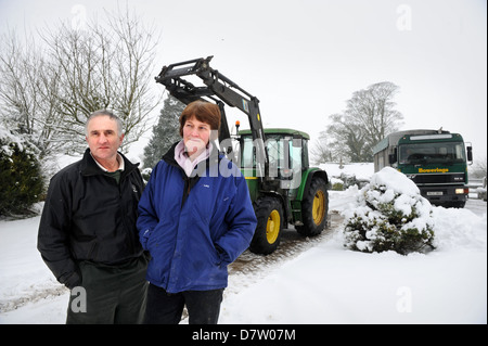 Dairy Farmers Chris & Liz Best from Poole Farm Leighterton near Tetbury, Gloucestershire who have had to discard milk when the t Stock Photo