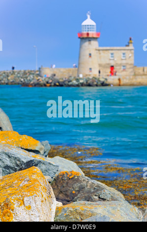 LIGHTHOUSE AT HOWTH HARBOR IN IRELAND Stock Photo