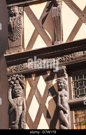 Wooden sculptures adorn a half-timbered house in Angers, Maine-et-Loire, France Stock Photo