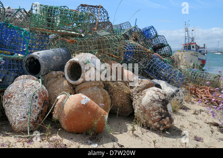 Stack of lobster pots and ceramic octopus pots on Culatra island, Parque Natural da Ria Formosa, near Olhao, Algarve, Portugal Stock Photo