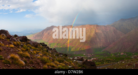 Moroccan High Atlas landscape showing rainbow in the mountains just outside Oukaimeden ski resort, Morocco, North Africa Stock Photo