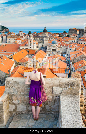 Tourist sightseeing on Dubrovnik City Walls, Old Town, UNESCO World Heritage Site, Dubrovnik, Dalmatian Coast, Croatia Stock Photo