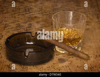 Whisky and cigar on a wooden table Stock Photo