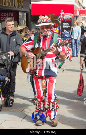 Paul Woodhead as 'Woody's One Man Band', street performing on Deansgate, Bolton during the annual 2012 Bolton Food Festival. Stock Photo