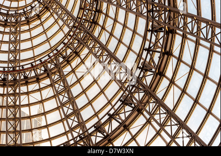 The architectural glass and steel spire that caps the historic Shot Tower in Melbourne Central shopping mall. Stock Photo