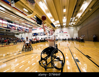 May 13, 2013 - Colorado Springs, Colorado, U.S. -  JUSTIN GAERTNER of the Special Operations team goes through layup drills during the Wheelchair Basketball tournament at the 2013 Warrior Games, competition for wounded, ill and injured service members. A total of 260 Army, Marine Corps, Navy/Coast Guard, Air Force, Special Operations and British Armed Forces service members with amputations, spinal cord injuries, post-traumatic stress disorder and traumatic brain injury are expected to take part during the six days of competition.  Events include archery, cycling,  basketball, shooting, swimmi Stock Photo