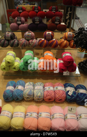 wool shop at night in lucca tuscany italy Stock Photo