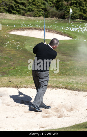Concentration at golf practice.Gleneagles Scotland UK Stock Photo