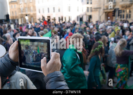 Using an ipad tablets mobile devise to take photographs photos May day Oxford Oxfordshire 2013 2010s UK  HOMER SYKES Stock Photo