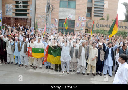 Supporters of Hazara Democratic Party (HDP) chant slogans against alleged rigging in general elections during protest demonstration at Quetta press club on Tuesday, May 14, 2013. Stock Photo