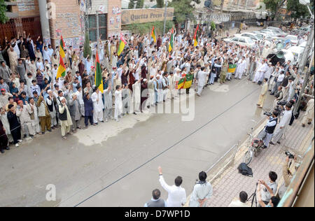 Supporters of Hazara Democratic Party (HDP) chant slogans against alleged rigging in general elections during protest demonstration at Quetta press club on Tuesday, May 14, 2013. Stock Photo