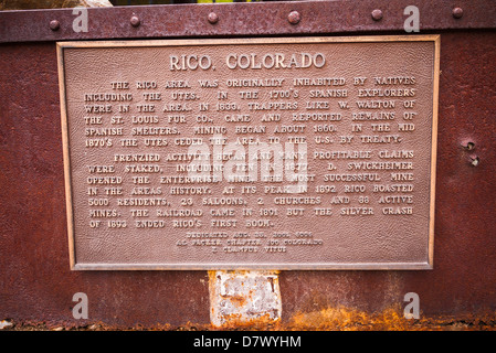 Ore cart and Interpretive plaque at the Rico silver mine, Rico, Colorado USA Stock Photo