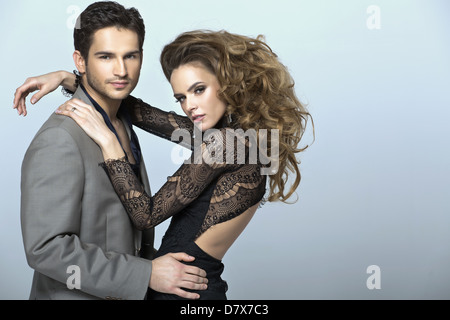 Calm young man with rapacious woman Stock Photo
