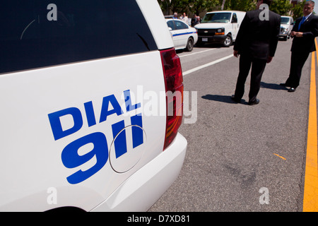 Dial 911 sign on police car - Washington, DC USA Stock Photo