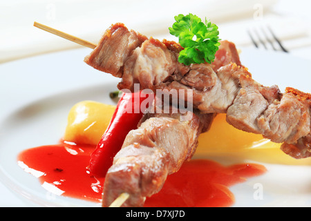 Grilled chunks of pork on skewers Stock Photo