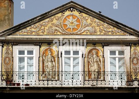 Facade of Casa do Ferreira das Tabuletas house which dates to 1864 decorated with figurative hand-painted azulejos tiles depicting allegorical figures in Bairro Alto district Lisbon Portugal Stock Photo