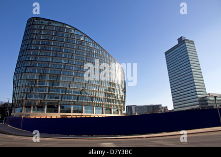 1 Angel Square,Co-operative Group's new HQ, 1st phase of NOMA development, 1960s CIS tower to right, city centre, Manchester, UK Stock Photo