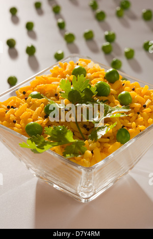 Poha- beaten rice and vegetables Stock Photo