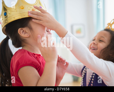 Girls playing dress up together Stock Photo