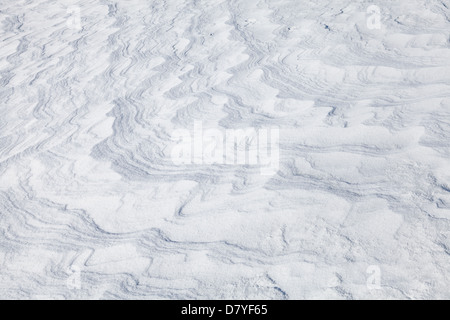 Abstract background texture of snowdrift with nice curved shadows Stock Photo