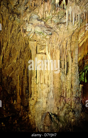 Colorful detail from inside Diros cave with lot of stalactites and stalagmites. Stock Photo