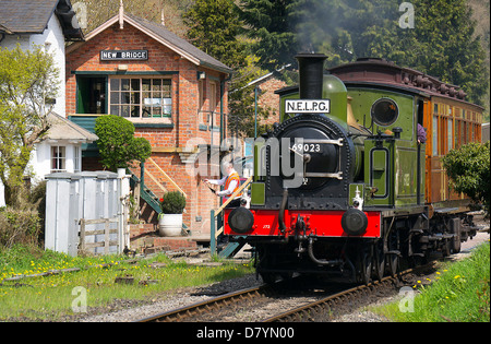 Steam Train departing with passenger service on heritage line Stock Photo