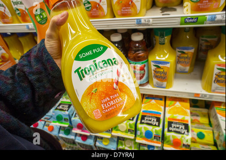 Containers of orange juice from Florida are seen in a supermarket refrigerator case in New York Stock Photo