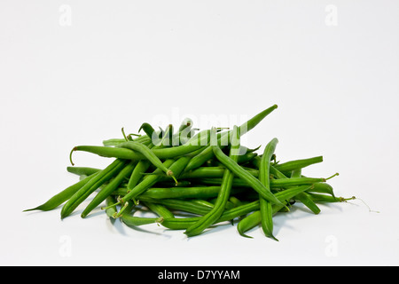 A pile of fresh green beans against a white background. Stock Photo