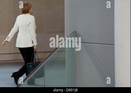 German Chancellor Angela Merkel leaves after a meeting of the German Bundestag parliament in Berlin, Germany, 16 May 2013. Photo: MAURIZIO GAMBARINI Stock Photo