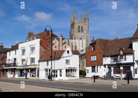 View of church and High Street with Woolpack Hotel Stock Photo