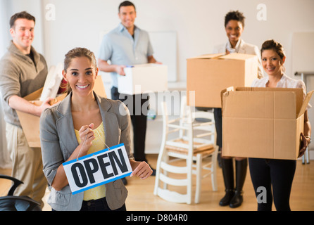 Business people opening new office Stock Photo